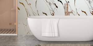 transforming-small-spaces-with-panels-and-flooring-gold-marble-shower-panels-bathroom-floors-to-walls